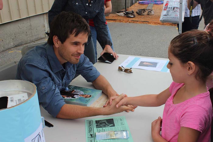 kind man shaking hands with girl