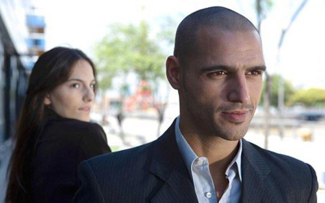 mysterious man ignoring woman